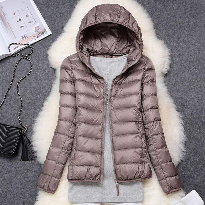 Klara™ – Neue wasserdichte Jacke mit weißer Entendaunenfüllung