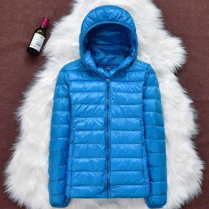 Klara™ – Neue wasserdichte Jacke mit weißer Entendaunenfüllung