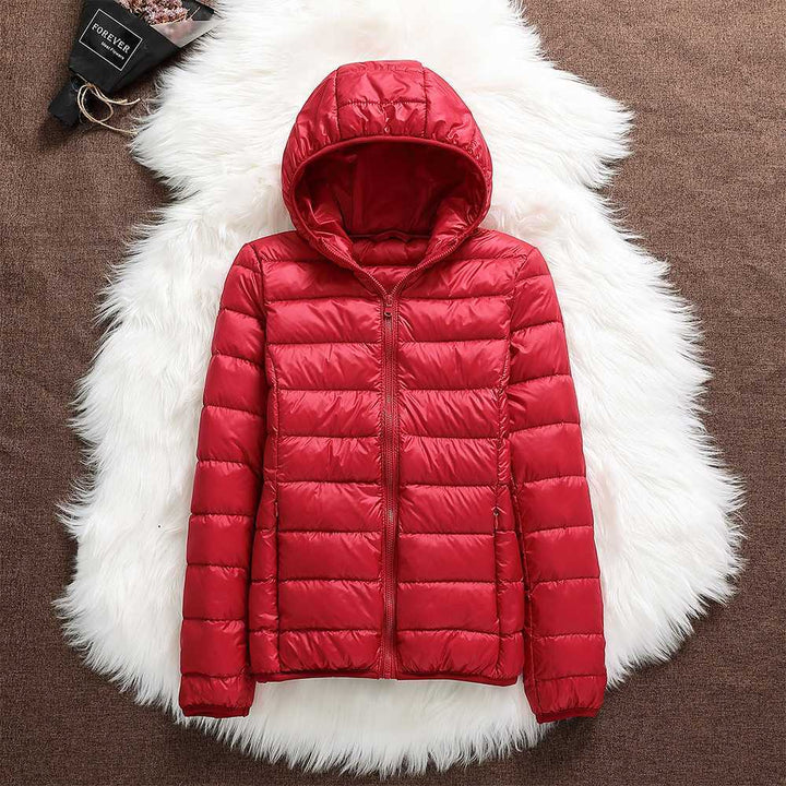 Klara™ – Neue wasserdichte Jacke mit weißer Entendaunenfüllung