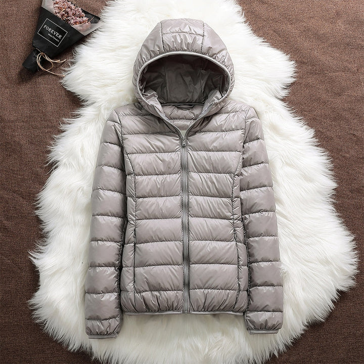 Klara™ – Neue wasserdichte Jacke mit weißer Entendaunenfüllung