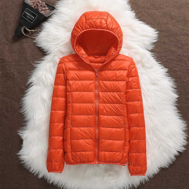 Klara™ – Neue wasserdichte Jacke mit weißer Entendaunenfüllung