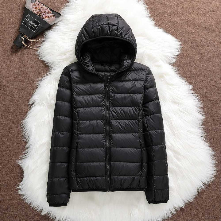 Klara™ – Neue wasserdichte Jacke mit weißer Entendaunenfüllung