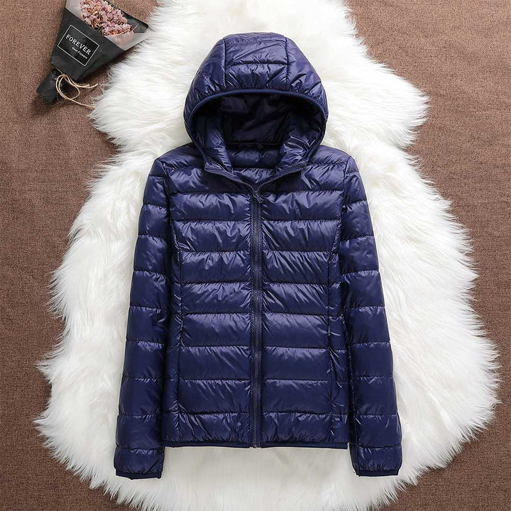 Klara™ – Neue wasserdichte Jacke mit weißer Entendaunenfüllung