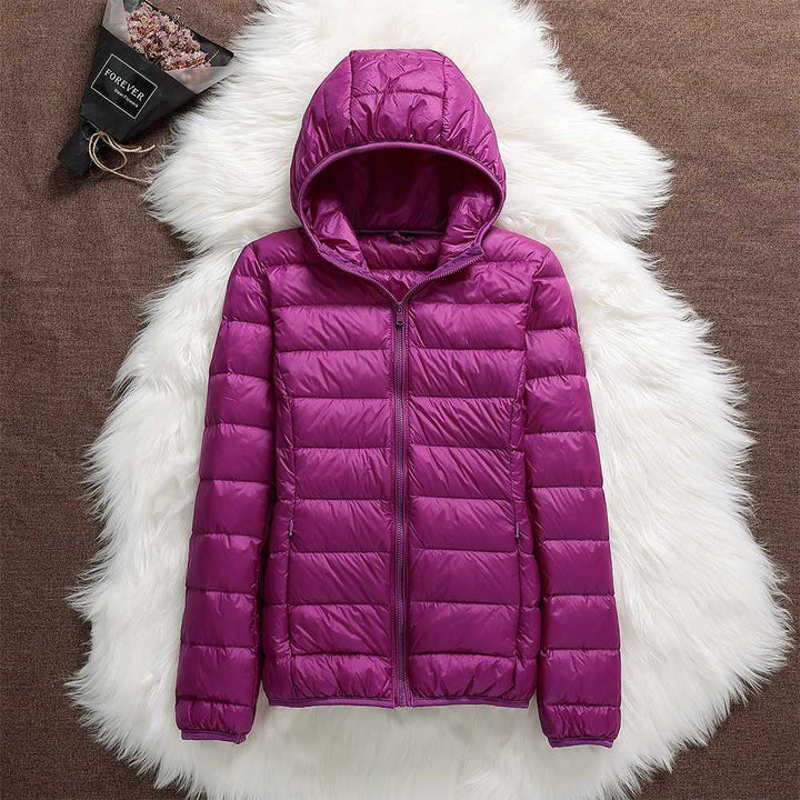 Klara™ – Neue wasserdichte Jacke mit weißer Entendaunenfüllung