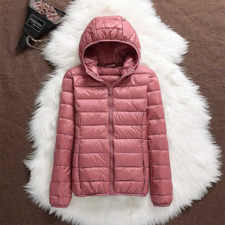 Klara™ – Neue wasserdichte Jacke mit weißer Entendaunenfüllung